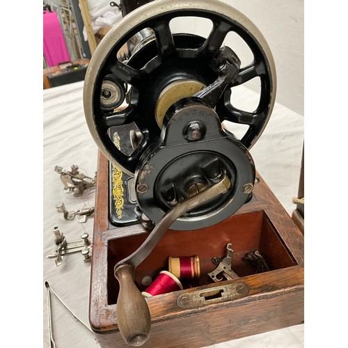 397 - ANTIQUE SINGER SEWING MACHINE IN ORIGNAL OAK CASE