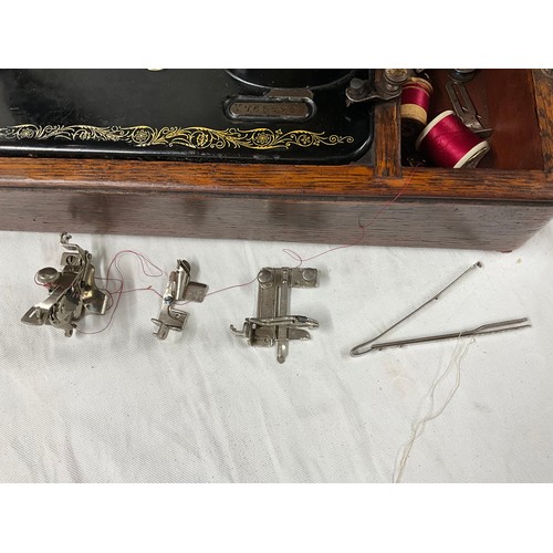 397 - ANTIQUE SINGER SEWING MACHINE IN ORIGNAL OAK CASE