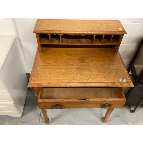 370 - EDWARDIAN OAK SMALL WRITING TABLE WITH PIGEON HOLES W28