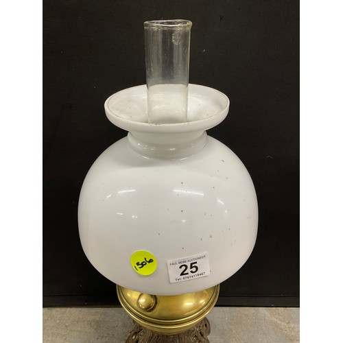 25 - ANTQIUE CAST IRON AND BRASS OIL LAMP WITH A WHITE GLASS SHADE COMPLETE WITH FUNNEL H 23”