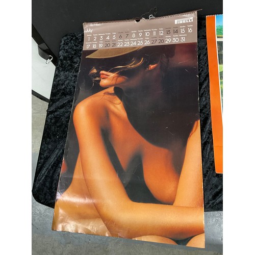 45 - THREE VINTAGE CALENDARS TO INCLUDE PIRELLI 1973-1974 AND AVON 1974