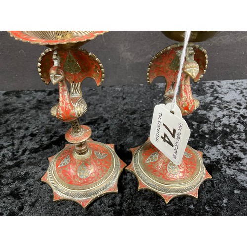 74 - VINTAGE INDIAN PAINTED BRASS COBRA CANDLESTICK ALONG WITH A SIMILAR PAIR OF BIRD CANDLESTICKS