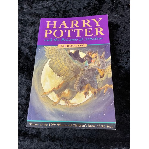 75 - SIX HARRY POTTER PAPERBACK BOOKS TO INCLUDE FIRST EDITIONS OF THE PRISONER OF AZKABAN, THE CHAMBER O... 