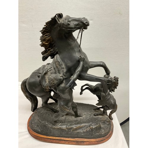 81 - PAIR OF ANTIQUE SPELTER MARLEY HORSES H16