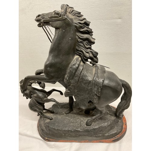 81 - PAIR OF ANTIQUE SPELTER MARLEY HORSES H16