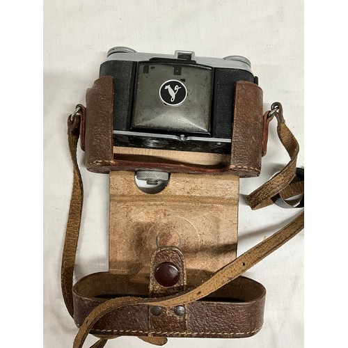 86 - TWO ANTIQUE FOLDING CAMERAS, LIGHT METER AND A UNIVERSAL AVOMINOR ALL IN LEATHER CASES