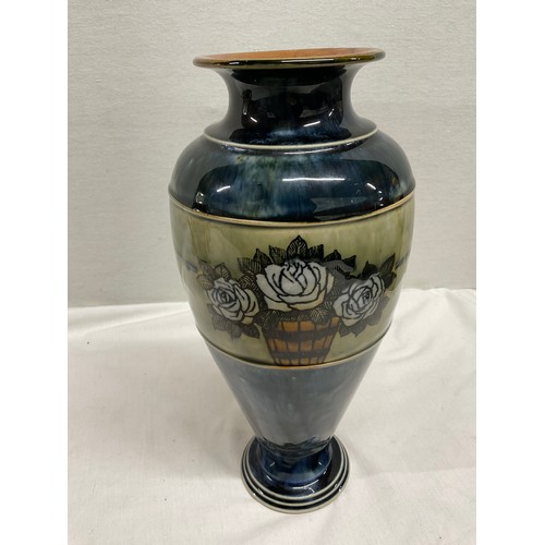 107 - ANTIQUE LAMBETH DOULTON STONEWARE VASE DEOCRATED WITH A BAND OF ROSES H11