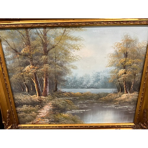 123 - THREE GILT FRAMED OILS ON CANVAS LANDSCAPES 24