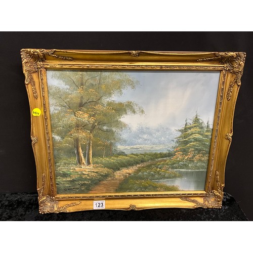 123 - THREE GILT FRAMED OILS ON CANVAS LANDSCAPES 24