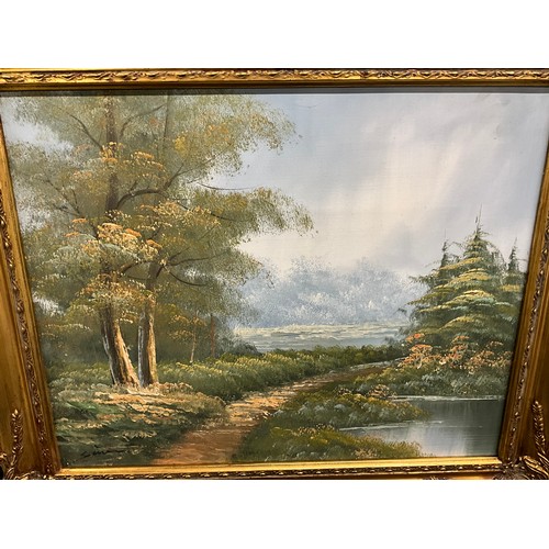 123 - THREE GILT FRAMED OILS ON CANVAS LANDSCAPES 24