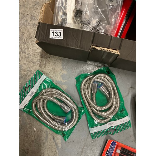 133 - THREE BOXES OF ASSORTED HARDWARE TO INCLUDE SHOWER HOSES, TOOLS ETC