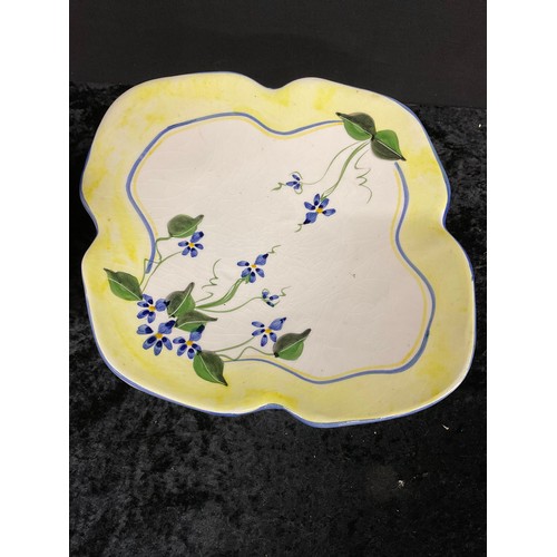 179 - YELLOW CERAMIC GLAZED FLOWER VASE AND A HAND PAINTED CERAMIC DISH MOUNTED ON FOUR FEET