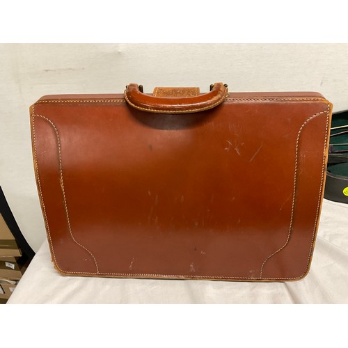 195 - VIOLIN IN HARD WOOD CASE (SIGNS OF WORM) WITH TWO BOWS AND A LEATHER GENTLEMANS BRIEFCASE