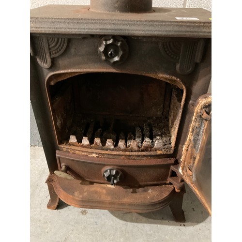 246 - CAST IRON WOOD BURNING STOVE H 23