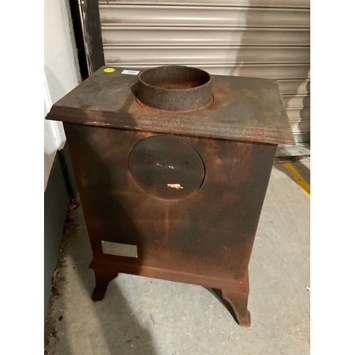 246 - CAST IRON WOOD BURNING STOVE H 23