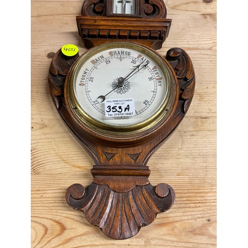 353A - EDWARDIAN BAROMETER IN A CARVED OAK CASE H24