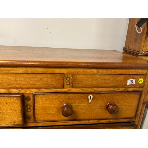 356 - VICTORIAN GOLDEN OAK TWO OVER THREE BRACKET FOOT CHEST WITH THREE SECRET DRAWERS TO TOP W47