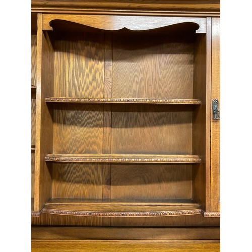 358 - LARGE EDWARDIAN DRESSER WITH OPEN CENTER RACK FLANKED BY 2 GLAED DOORS OVER 3 CENTRAL DRAWERS FLANKE... 