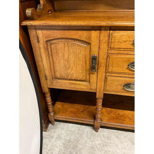 358 - LARGE EDWARDIAN DRESSER WITH OPEN CENTER RACK FLANKED BY 2 GLAED DOORS OVER 3 CENTRAL DRAWERS FLANKE... 