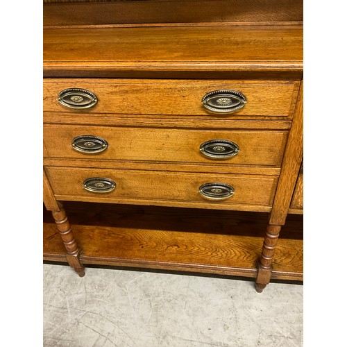 358 - LARGE EDWARDIAN DRESSER WITH OPEN CENTER RACK FLANKED BY 2 GLAED DOORS OVER 3 CENTRAL DRAWERS FLANKE... 