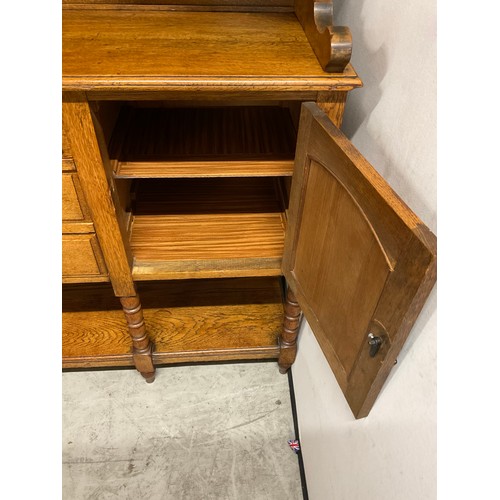 358 - LARGE EDWARDIAN DRESSER WITH OPEN CENTER RACK FLANKED BY 2 GLAED DOORS OVER 3 CENTRAL DRAWERS FLANKE... 