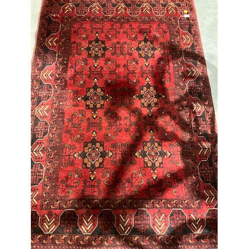 281 - ANTIQUE RED PATTERNED CARPET 74