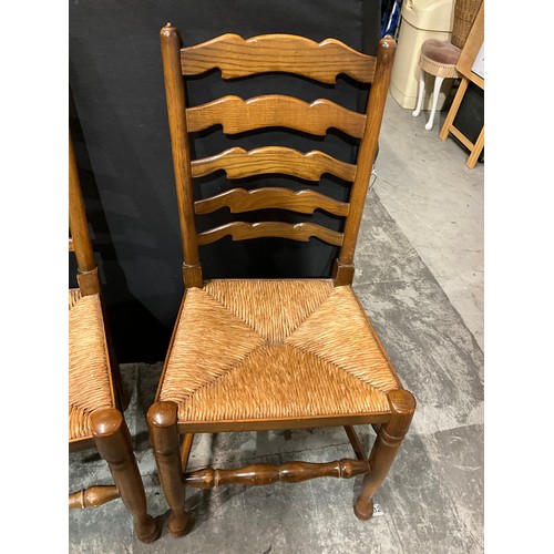 302 - SET OF FOUR VINTAGE LADDER BACK DINING CHAIRS WITH RUSH SEATS