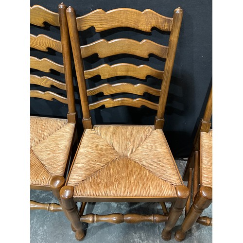 302 - SET OF FOUR VINTAGE LADDER BACK DINING CHAIRS WITH RUSH SEATS