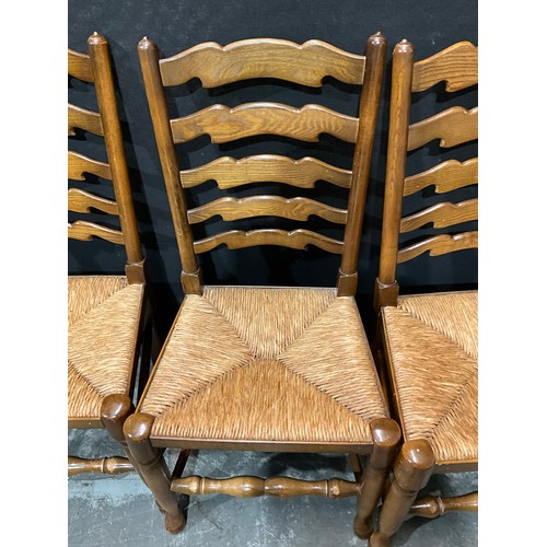 302 - SET OF FOUR VINTAGE LADDER BACK DINING CHAIRS WITH RUSH SEATS