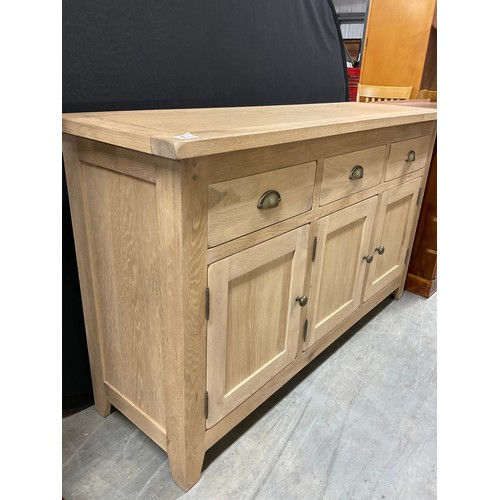 409 - MODERN LIGHT OAK SIDEBAORD THREE DRAWERS ABOVE THREE DOORS W54