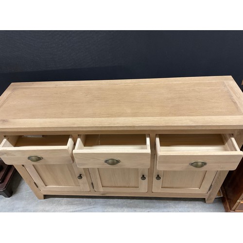 409 - MODERN LIGHT OAK SIDEBAORD THREE DRAWERS ABOVE THREE DOORS W54