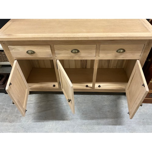 409 - MODERN LIGHT OAK SIDEBAORD THREE DRAWERS ABOVE THREE DOORS W54