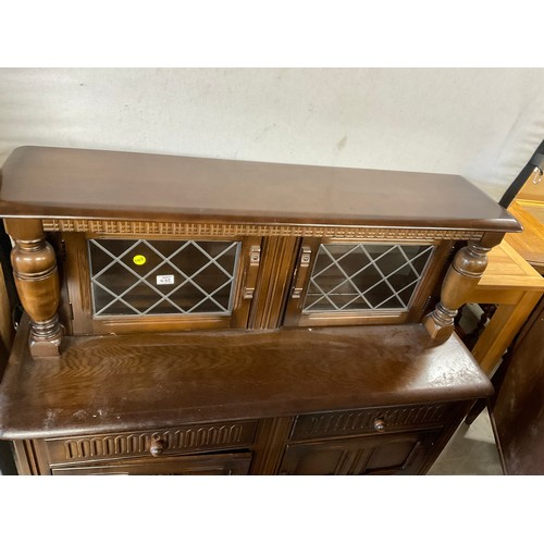 432 - OAK PRIORY STYLE COURT CUPBOARD TWO DRAWERS ABOVE TWO DOORS AND 2 GLASS DOORS TO TOP  W47