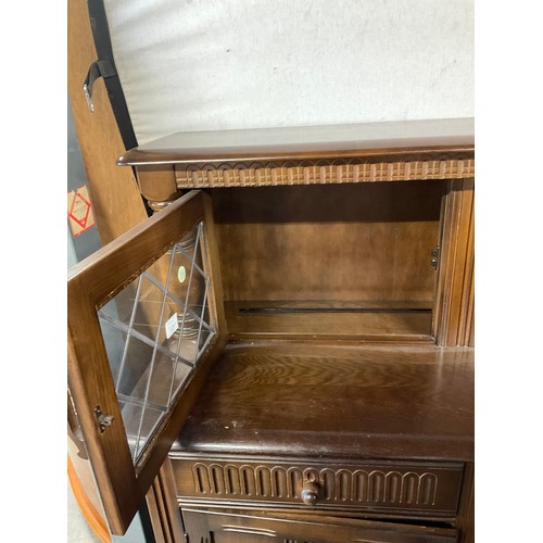 432 - OAK PRIORY STYLE COURT CUPBOARD TWO DRAWERS ABOVE TWO DOORS AND 2 GLASS DOORS TO TOP  W47