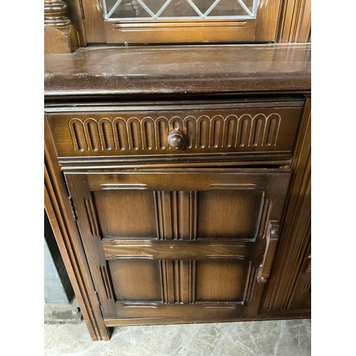 432 - OAK PRIORY STYLE COURT CUPBOARD TWO DRAWERS ABOVE TWO DOORS AND 2 GLASS DOORS TO TOP  W47