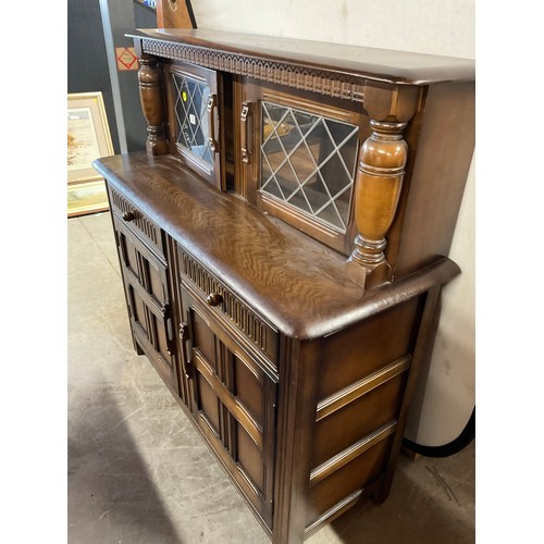 432 - OAK PRIORY STYLE COURT CUPBOARD TWO DRAWERS ABOVE TWO DOORS AND 2 GLASS DOORS TO TOP  W47