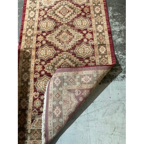 293 - TWO VINTAGE PATTERNED CARPETS 57” X 32”