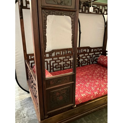 307 - REPRODUCTION ORIENTAL MAHOGANY FRAMED OPIUM BED WITH CARVED PANELS D 42