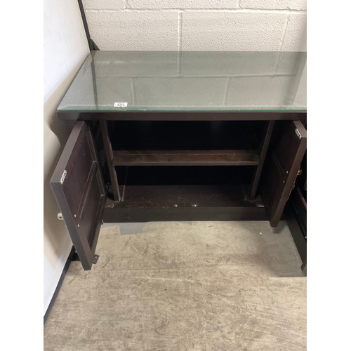 384 - LARGE MODERN CHINESE STYLE GLASS TOPPED LOW SIDEBOARD WITH TWO DRAWERS AND FOUR CUPBOARD DOORS W80