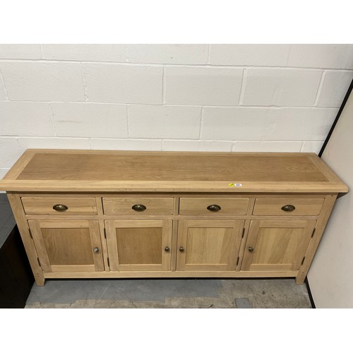 387 - MODERN OAK SIDEBAORD WITH FOUR DRAWERS OVER FOUR CUPBOARD W74