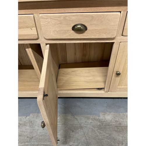 387 - MODERN OAK SIDEBAORD WITH FOUR DRAWERS OVER FOUR CUPBOARD W74