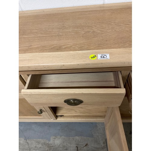 387 - MODERN OAK SIDEBAORD WITH FOUR DRAWERS OVER FOUR CUPBOARD W74