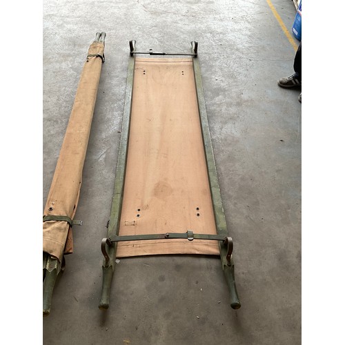 401 - TWO LARGE  VINTAGE MILITARY CANVAS AND  WOODEN FRAMED FOLDING STRETCHERS L91