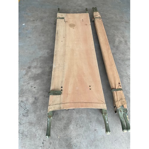 401 - TWO LARGE  VINTAGE MILITARY CANVAS AND  WOODEN FRAMED FOLDING STRETCHERS L91