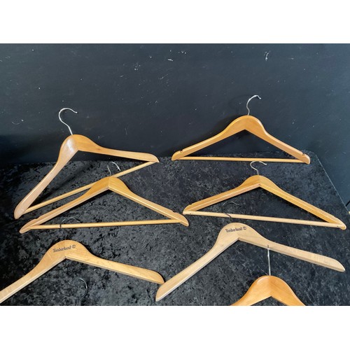 18 - LARGE QUANTITY OF VINTAGE WOODEN CLOTHES HANGERS