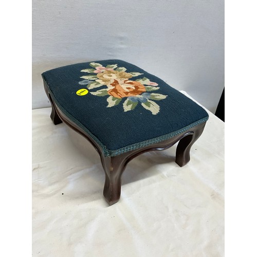 57 - TWO WOODEN FOOT STOOLS WITH EMBROIDERED TOPS