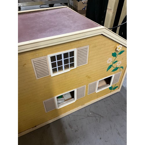 63 - VINTAGE DOLLS HOUSE WITH PERIOD FURNITURE AND A WOODEN VINTAGE DOLLS COT WITH DOLL