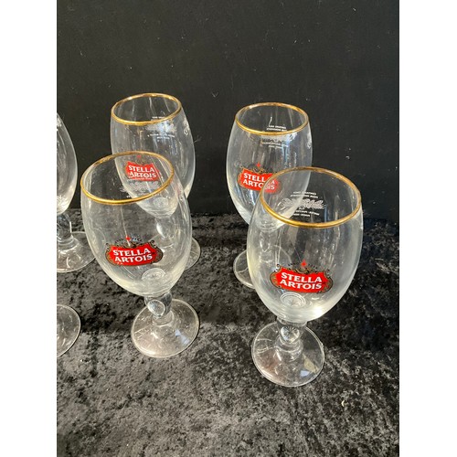 78 - TWO CRATES OF DRINKING  GLASSES AND WINE GLASSES TO INCLUDE STELLA ETC