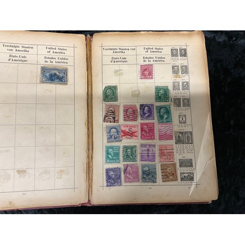 110 - TWO ALBUMS OF USED POSTAGE STAMPS AROUND THE WORLD