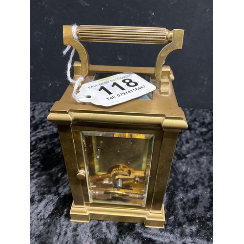 118 - SMALL BRASS CARRIAGE CLOCK WITH BEVELLED GLASS MADE BY WHYTTOCK AND SONS - HEIGHT 6”